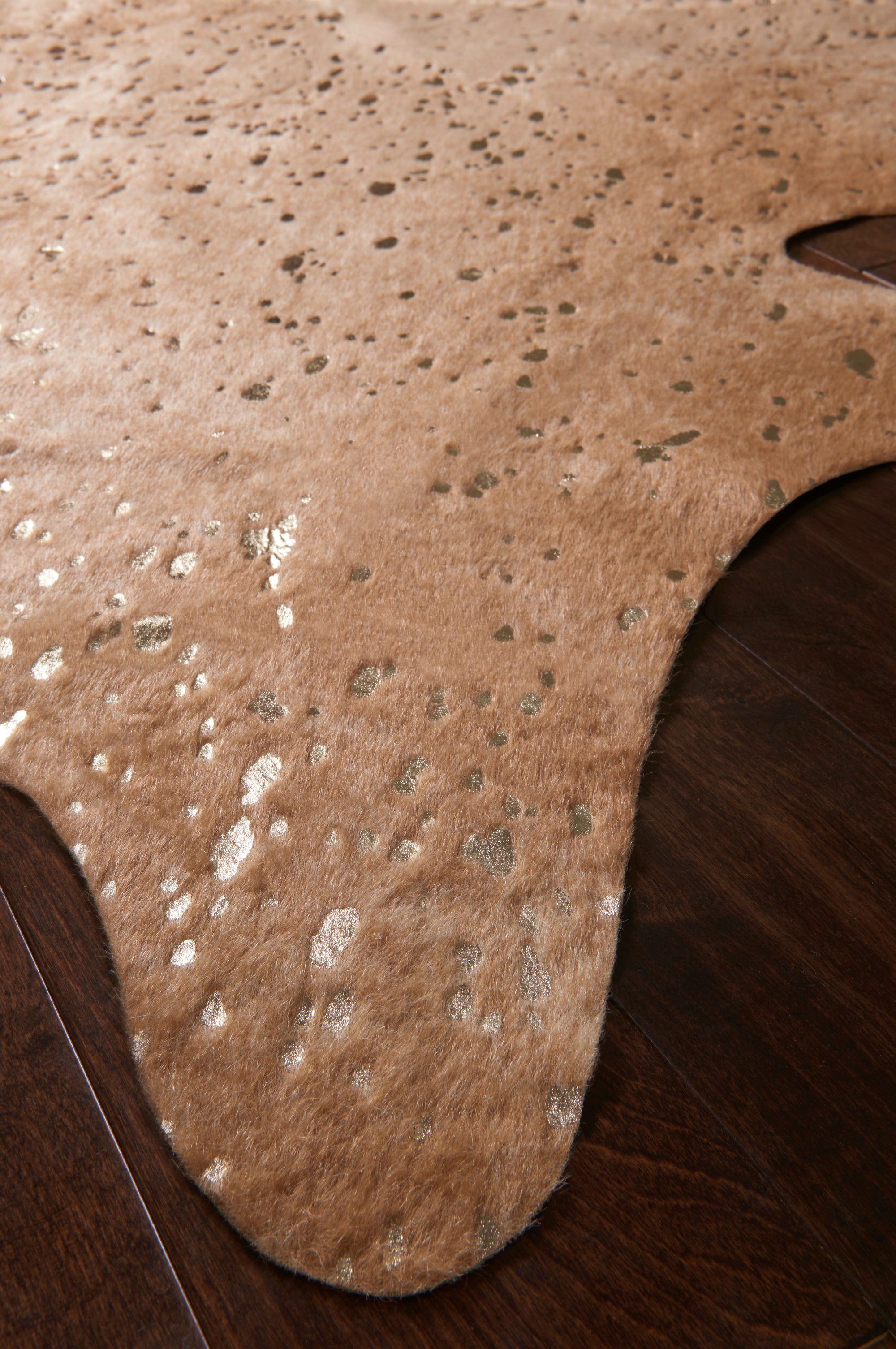 Tan Cowhide Rug With Gold Details