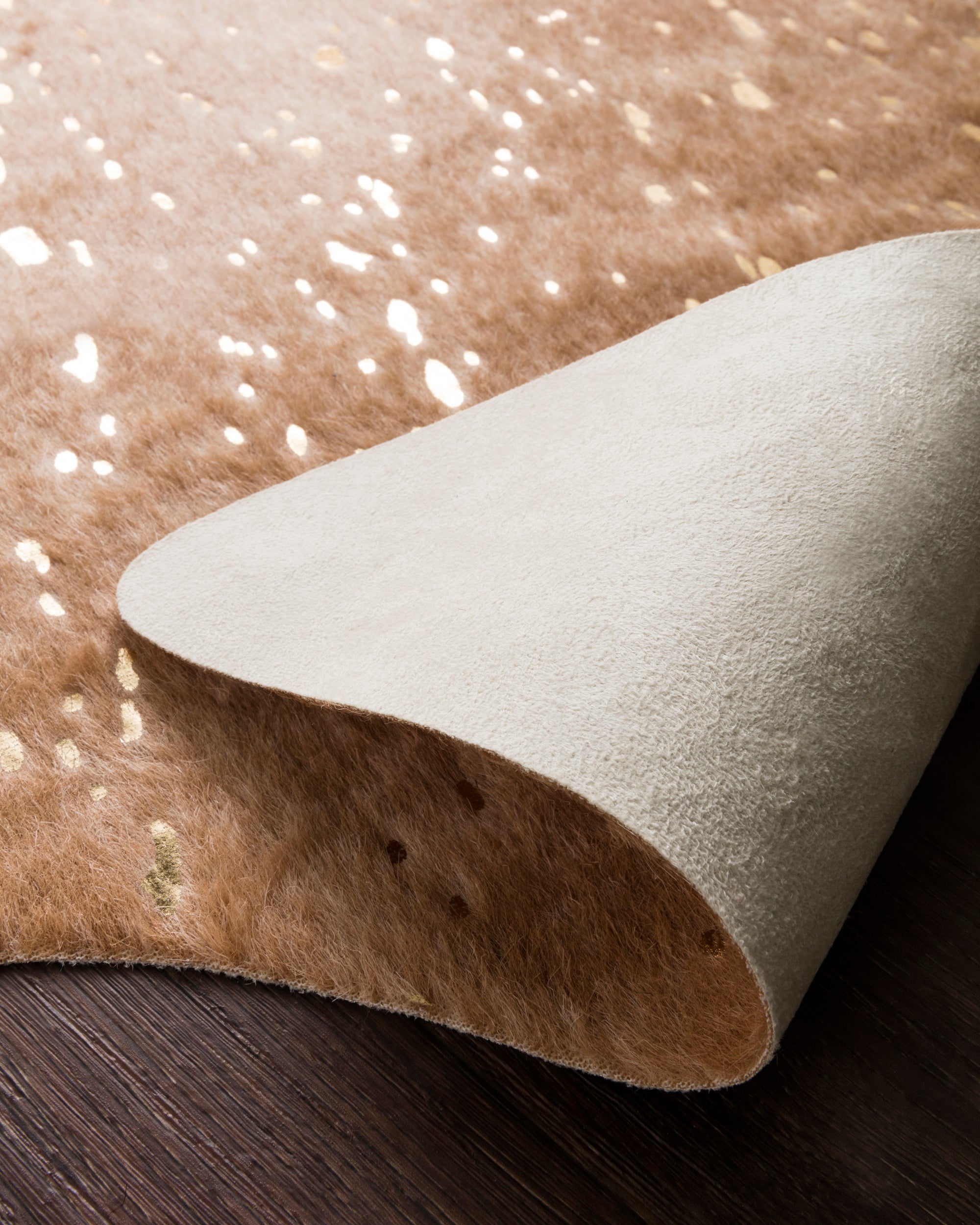 Tan Cowhide Rug With Gold Details