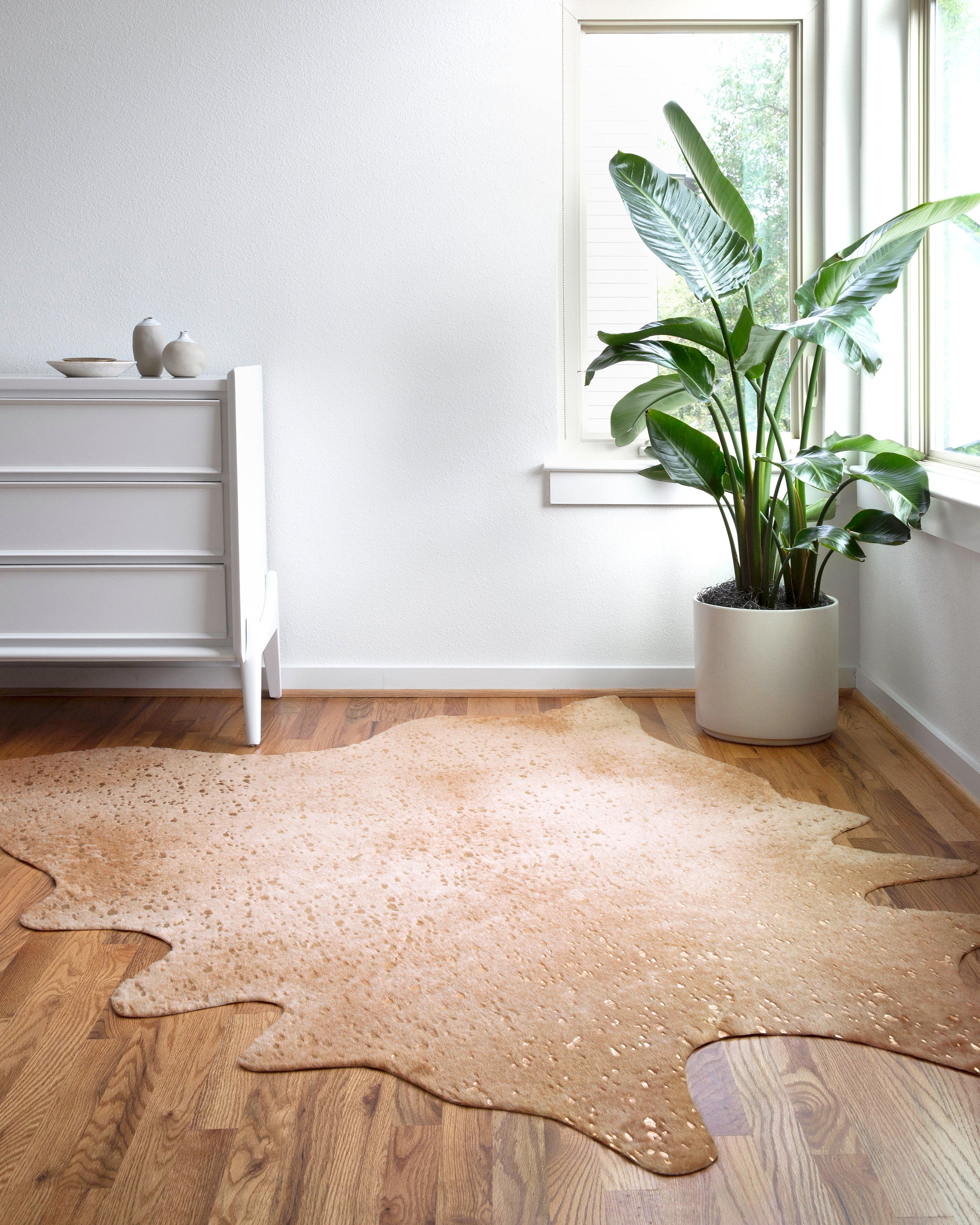 Tan Cowhide Rug With Gold Details